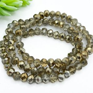 Close-up of stacked Crystal Brown bracelets