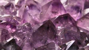 Collecting purple crystals from different sources