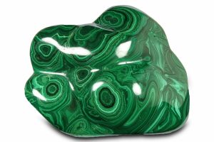 A polished piece of Malachite showing its banded patterns