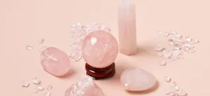 A collection of Pink Quartz Crystal and Rose Quartz items, including jewelry, raw stones, and home decor pieces